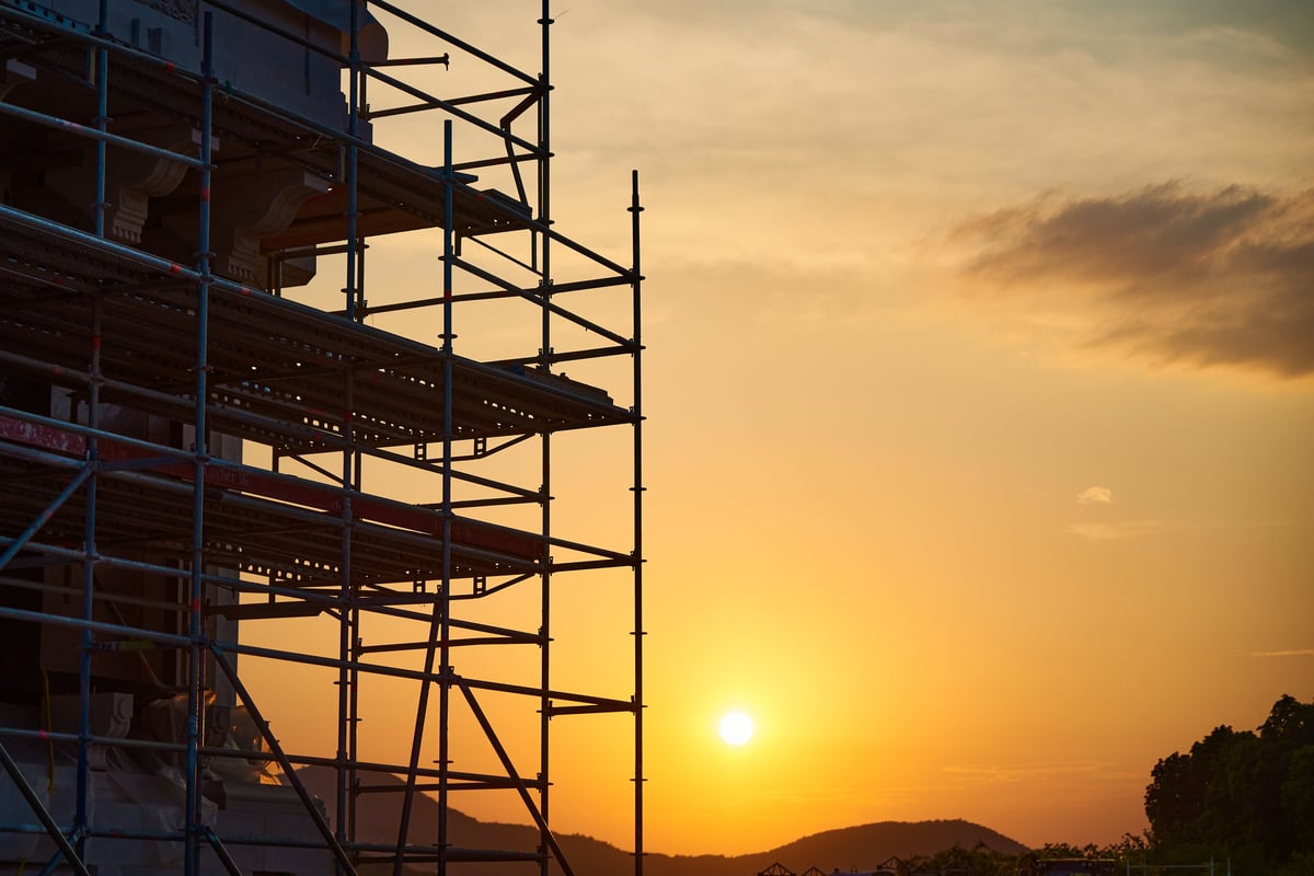 Metal scaffolding at sunset